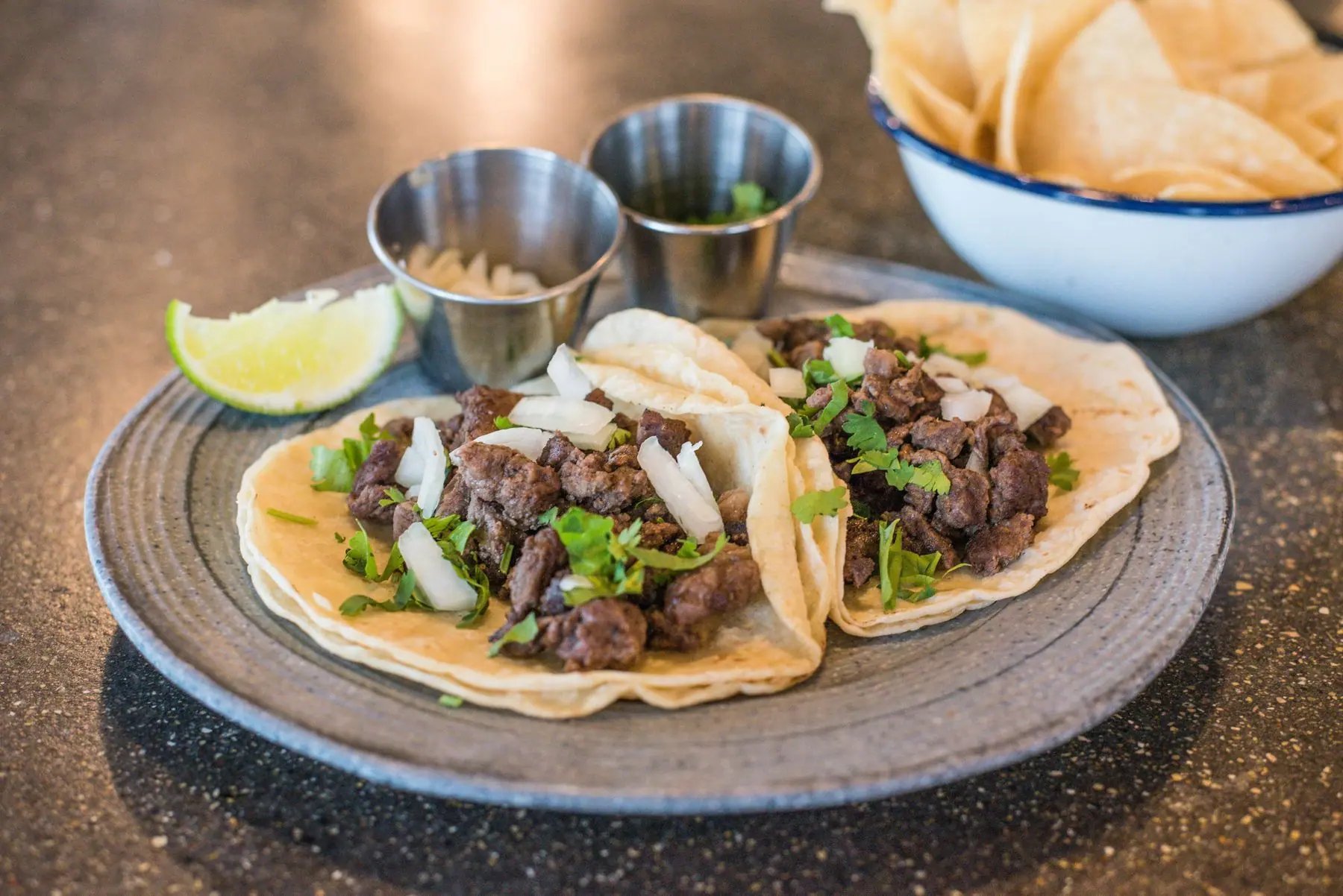 Tacos with salsas and lime